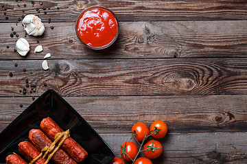 Image showing Sausage roasted on the grill.