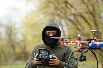 Image showing Man flying with the drone