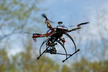 Image showing Drone flying in forest