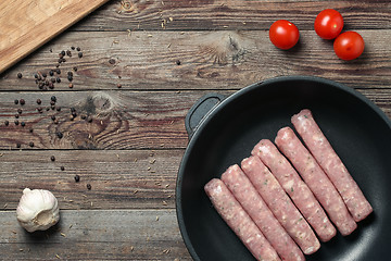 Image showing Raw Sausages in a Pan