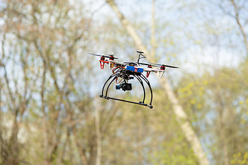 Image showing Drone flying in forest