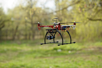 Image showing Drone flying in forest