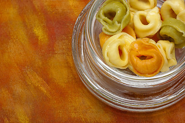 Image showing Freshly boiled tortellini (with meat, tomato and spinach filling