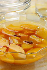 Image showing Glass bowl filled by apple compote