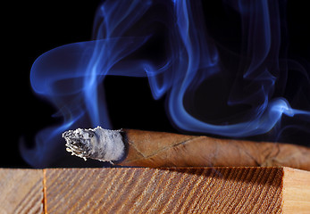 Image showing Cigar with abstract smoke