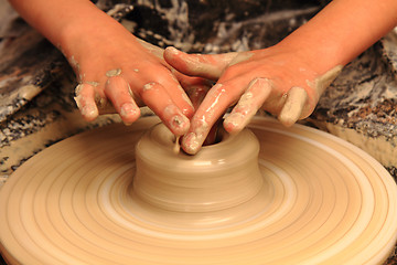 Image showing Pottery making close-up.\r\n