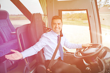 Image showing happy driver inviting on board of intercity bus