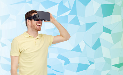 Image showing happy man in virtual reality headset or 3d glasses