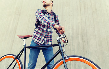 Image showing hipster man with fixed gear bike and backpack