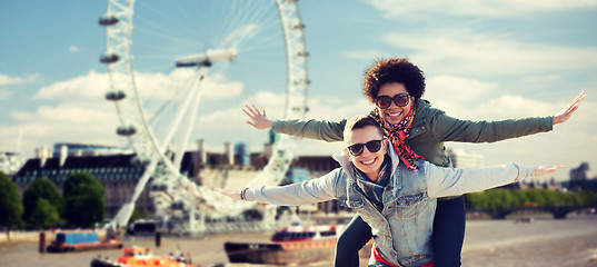 Image showing happy teenage couple having fun over london