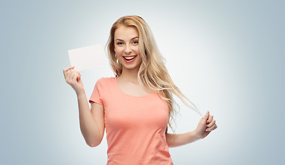 Image showing happy woman or teen girl with blank white paper