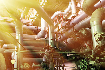 Image showing Equipment, cables and piping as found inside of a modern industr