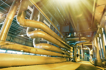 Image showing Equipment, cables and piping as found inside of a modern industr