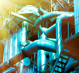 Image showing Pipes, tubes, machinery and steam turbine at a power plant