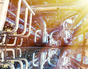 Image showing Industrial zone, Steel pipelines in blue tones with reflection