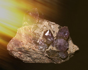Image showing natural amethyst crystallized structure on black background     