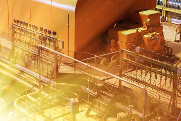 Image showing Equipment, cables and piping as found inside of a modern industr