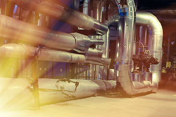 Image showing Equipment, cables and piping as found inside of a modern industr