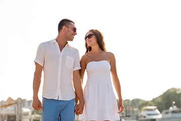 Image showing smiling couple in city