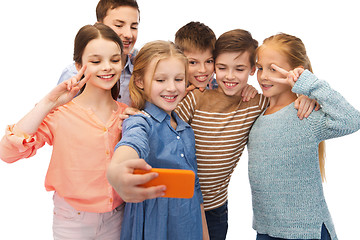 Image showing happy children talking selfie by smartphone