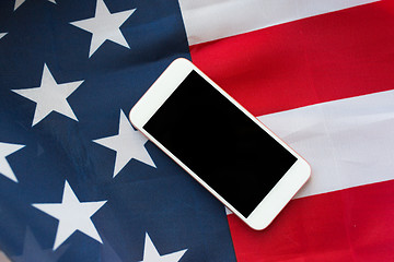 Image showing close up of smartphone on american flag