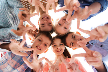 Image showing happy children showing peace hand sign