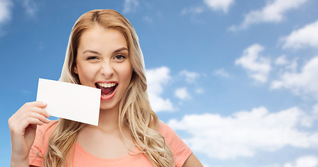 Image showing happy woman or teen girl with blank white paper