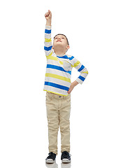 Image showing happy smiling little boy with raised hand