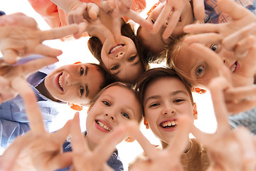 Image showing happy children showing peace hand sign