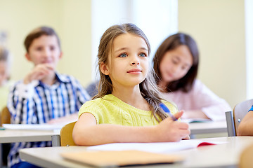 Image showing student girl with group of school kids in class