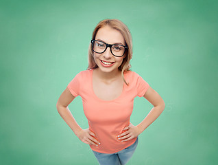 Image showing happy young woman or teenage girl in eyeglasses