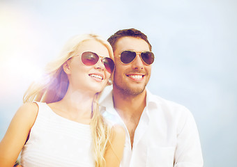 Image showing happy couple in sunglasses