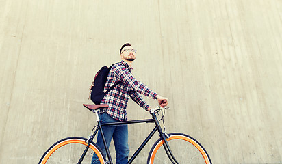 Image showing hipster man with fixed gear bike and backpack