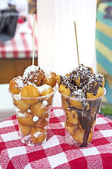Image showing Fritters with sugar and chocolate