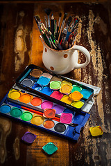Image showing Watercolors and brushes