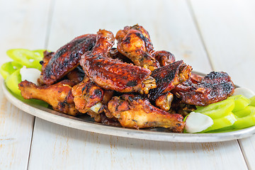 Image showing Delicious chicken wings in a honey glaze.