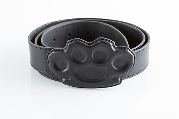 Image showing black belt with a buckle in the form of brass knuckles