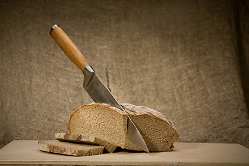 Image showing A slice of bread with butter 