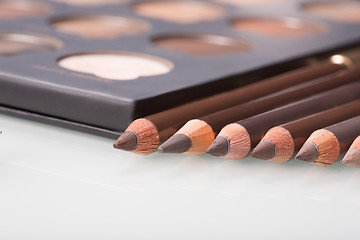 Image showing shadows eye and eyebrow set on table