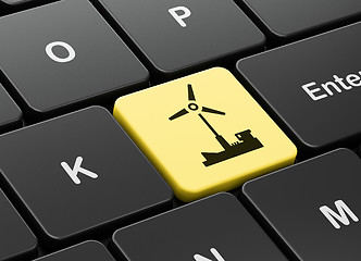 Image showing Manufacuring concept: Windmill on computer keyboard background