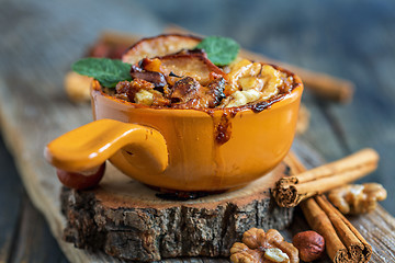 Image showing Oatmeal baked apple for a healthy breakfast.