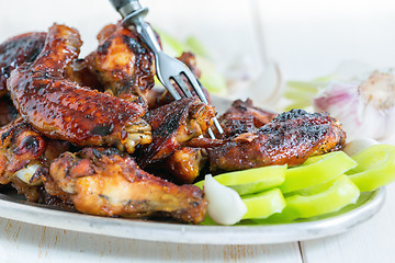 Image showing Fried chicken wings closeup.