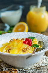 Image showing Millet porridge with nuts and lemon cream for a healthy breakfas