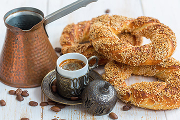 Image showing Breakfast with black coffee and Turkish bagels.
