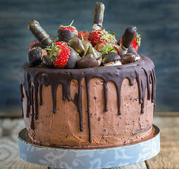 Image showing Chocolate cake with strawberries.