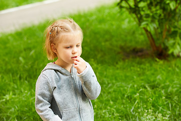 Image showing Portrait of a Thoughtful LIttle Girl