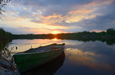 Image showing fisherman boat at sunset 