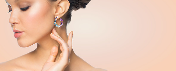 Image showing close up of beautiful woman face with earring