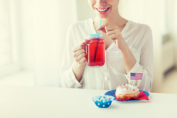 Image showing happy woman celebrating american independence day