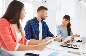 Image showing happy creative team or students working at office